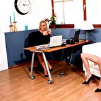Second pic of Skinny brunette Silvia Saint strips in the office showing her nude hot body