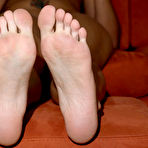 Third pic of Brunette Melanie Scott shows off her nice feet and gets her pussy licked and banged