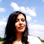 Second pic of Angela showing boobs in the field (Polish Busty)