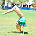 Third pic of Sassy blonde Veronica Weston shows her gymnast skills and flashes half nude body outdoors