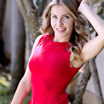 Second pic of Bjorg Larson fingering her sweet pussy in the backyard