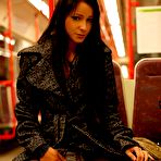 Fourth pic of Sexy brunette flashes in underground in public