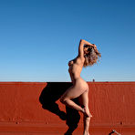 Third pic of Mia Valentine exposes her spectacular curves on the office building's rooftop