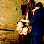 Third pic of Naked slave brunette Ageha Asagi hanging from the ceiling with hands behind her back