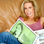 First pic of Fair-haired milf Marie Kelly pulls down her pink panties to show her hairy snatch