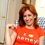 First pic of Mature lady Mikela Kennedy with hairy snatch removes her jeans and red panties