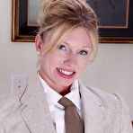 First pic of Blonde mom Mary Jane is more than willing to take off her top and show those tatas.