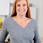 First pic of Naughty milf Anita Coxxx removes her jeans and undies to give a close-up of her experienced snatch