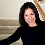 First pic of Busty Latino MILF slut Isabella Rodriguez gets rid of her clothes on the stairs and plays naughty