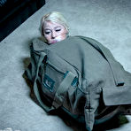 Third pic of SexPreviews - London River busty blonde is bound indoors and put in metal cage outdoor by maledom