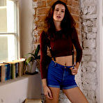 First pic of Mikaela McKenna slowly undresses in her cosy apartment