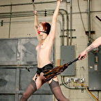 First pic of Slim tiny assed slave girl Sula Satanas in stockings with garters gets suspended, spanked and toyed