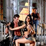 Fourth pic of Slutty brunette in tiny jeans skirt Victoria Sin demonstrates naked boobs in public