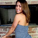 Third pic of Classy doll Taylor Lain strips and stays on all fours for beaver masturbation