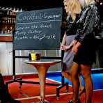 First pic of Eliss Fire shares a cock with another clothed blonde and then gets pee drenched