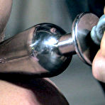 Second pic of SexPreviews - Wenona is metal bound naked exposed in dungeon her pussy clamped and ass toyed