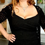 First pic of Horny curvy MILF playing with herself in the kitchen