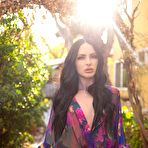 First pic of Carissa White glides through the patio while peeling off her sheer floral robe