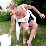 Second pic of Steamy hot MILF washing herself in the garden