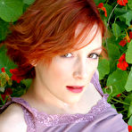 Third pic of Flat chested redhead girl Indiana Littlemutt with neatly trimmed bush poses naked
