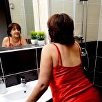 Second pic of Curvy mature Melana is showing off her first time in a solo shoot for mature.nl
