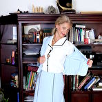 Second pic of Naughty American librarian playing with her wet pussy