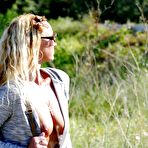 Fourth pic of NatalieK pantie stuffing and masturbation outdoors in public walk