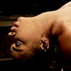 Third pic of Gagged dark skinned slave girl Angel Cummings has clamps on her perfectly shaped boobs.
