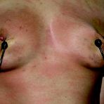 Fourth pic of BDSM girl Raina Verene gets her ass punished in a way she won't soon forget.