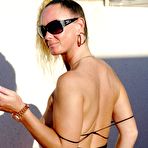 Second pic of NatalieK anal play with a vibrator outdoors in the sun