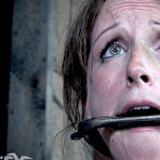 Third pic of SexPreviews - Brina James busty is bound in metal and wooden stock for cock sucking training