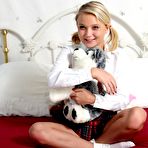 First pic of Uniform bimbo Dakota Sky exposes her well shaved nub and plays with the hole