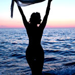 Fourth pic of Sensual busty blonde Cara Mell teasing on the beach at sunset | Erotic Beauties