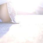 Fourth pic of Japanese idol Megumi Aisaka teasing in upskirt panty shots on bicycle | Erotic Beauties