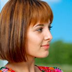 First pic of Beautiful brunette Monika G takes off her flowery dress and shows us her shaved slit