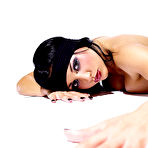 Third pic of Blindfolded brunette model Audrey Bitoni with big tits and ass hides her nipples and slit