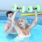 Second pic of Indica Monroe exercising on top of her trainer's throbbing cock