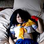 Third pic of Japanese babe Kan U teasing with upskirt panty shots in the bedroom | Erotic Beauties