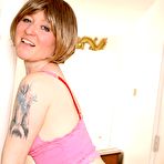 Second pic of Pale Mature Shows Fuzzy Snatch