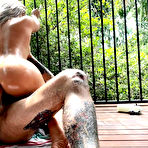 Third pic of Savannah Bond gets her round butt oiled up and slammed hard