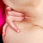 Second pic of Filthy doll Mia Mae is sticking two fingers inside the charming shaved beaver