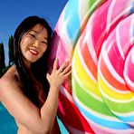 First pic of BikiniFanatics - Tight Japanese micro bikini model and her lollypop