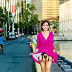 Third pic of Roni in pink dress and nylons flashing oudoors @ Roni's Paradise