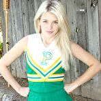 First pic of Petite girl Holly Van Hough removes her cheerleader uniform and shows her teen pussy outdoors