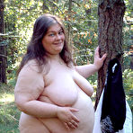Second pic of Fat naked MILF outdoors