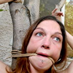 Fourth pic of Helpless slave girl Nadin with tight smooth pussy is tied in the backyard