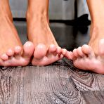 Third pic of Kinky lesbian maid Abby Byens licks nude blonde's sexy feet with appetite