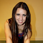 Second pic of Cute long haired brunette girl Jess West crushes a cock and does seductive striptease
