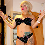 Third pic of Tattooed shaved blonde Tiffany Kingston poses naked after cock and ball crushing