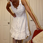 First pic of Big racked british blonde Jan Burton removes her dress after point-of-view cock crushing